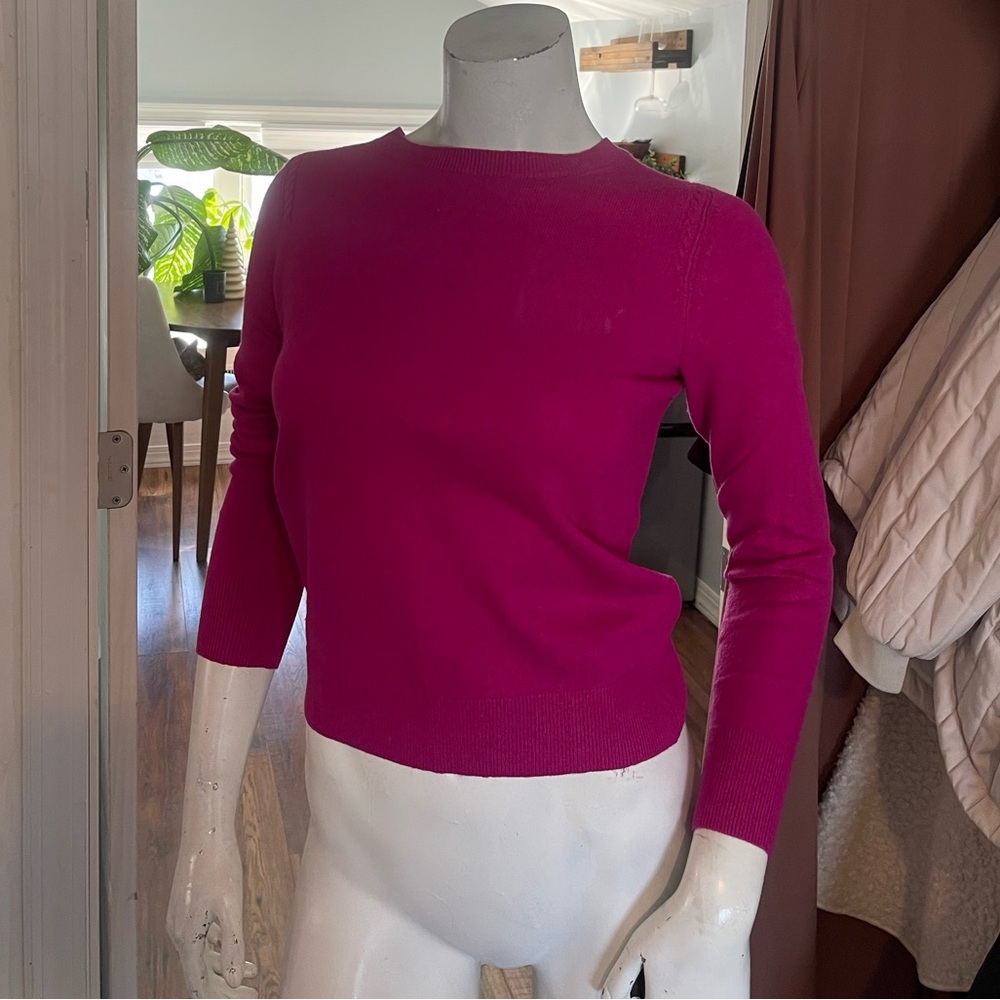 Sleek and snug, this tight-fit sweater defines chic comfort!